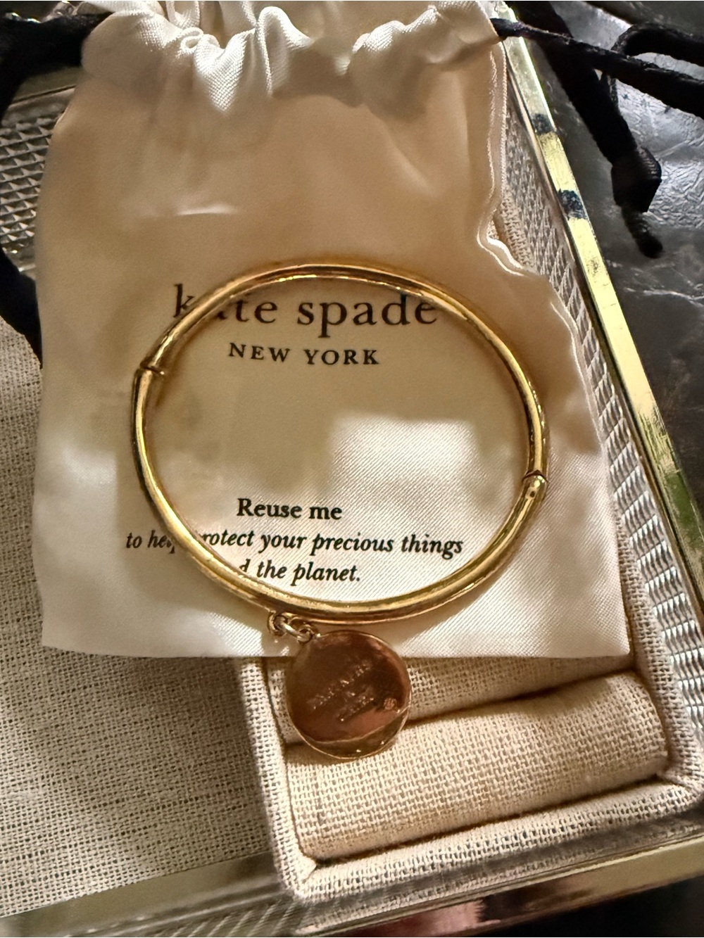 kate spade Partners in Crime Gold Tone Disc Charm Bangle Bracelet